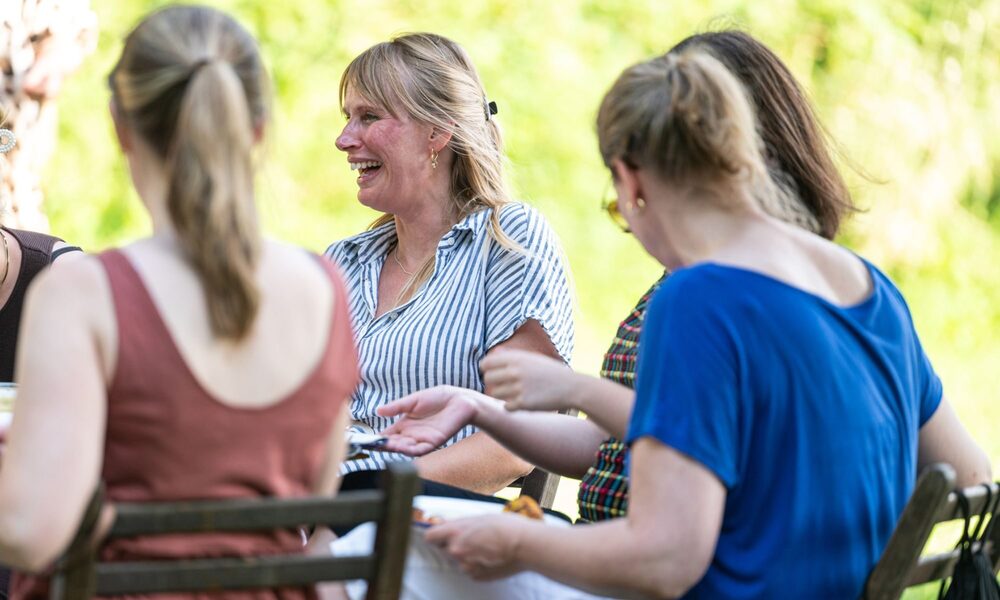 Lachen tijdens teamuitje Verenigingsmanagement Nederland
